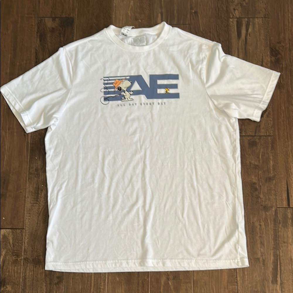 American Eagle Outfitters White Tee Featuring Snoopy